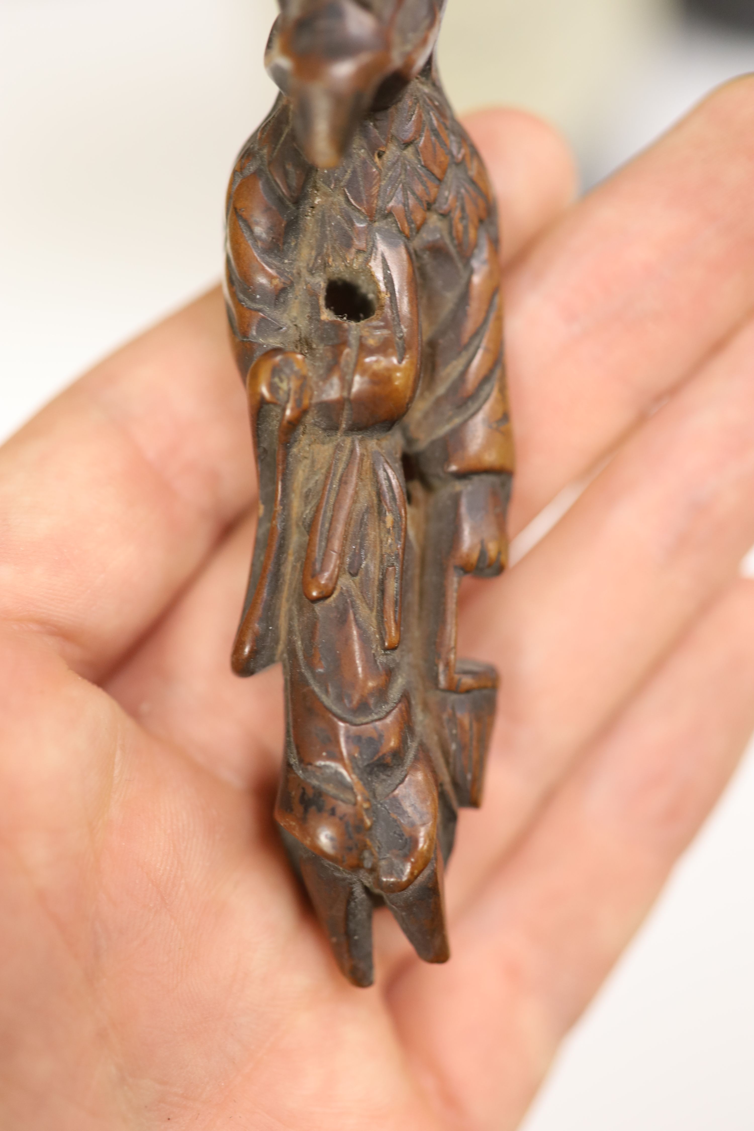 A small miscellaneous Oriental collection including enamel snuff boxes, Buddha carvings etc.